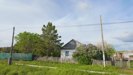 Typical-Village-House-Surrounded-By-Vegetation-At-Countryside-In-Kazakhstan