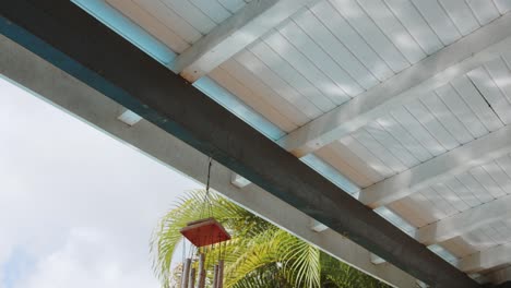 Mesmerising-water-ripples-reflected-onto-planked-ceiling