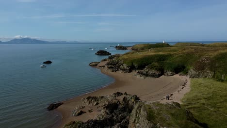 Ynys-Llanddwyn-peaceful-Welsh-island-beach-aerial-view-establishing-quiet-sandy-coastline