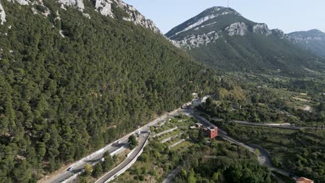 Aerial-Flyover-Of-Supramonte-Mountains,-Beautiful-Forest-Landscape-At-Sardinia-In-Italy