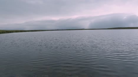 English-countryside-lake-tarn-in-North-Yorkshire,-England-United-Kingdom