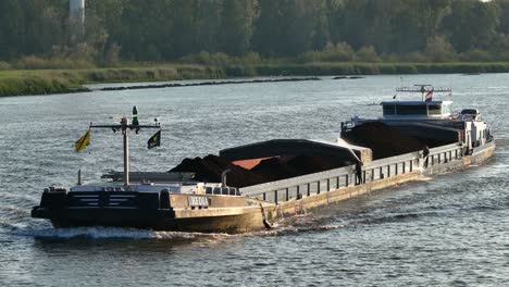 Open-angle-shot-of-Kedia-vessel-navigating-the-Barendrecht-Waterways-in-Netherlands