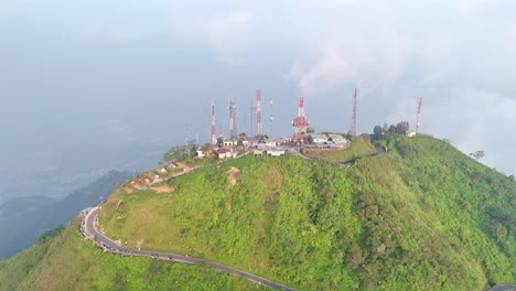 Aerial-view-of-Cellular-tower-building-on-the-top-of-mountain