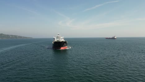 DRONE-VIEW-OF-OIL-TANKER-ARCTOS-MONROVIA-SAILING-NORTH-INTO-SAO-SEBASTAIAO-ILHABELA-PORT-IN-BRAZIL-1-OF-5