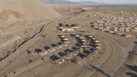 Aerial-view-of-the-abandoned-mining-settlement-of-Eagle-Mountain-in-southern-California,-showcases-the-concept-of-desertion-and-decay