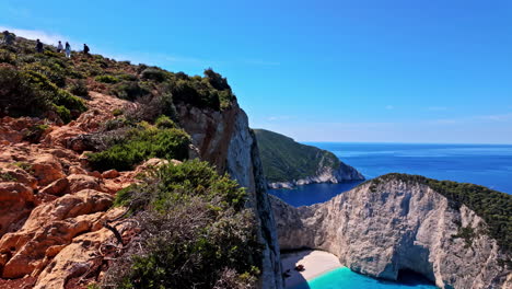 Panning-shot-of-a-coastal-cliff-viewpoint-on-a-Mediterranean-Island