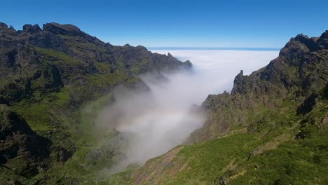 Explore-the-scenic-Pico-do-Pico-hiking-trail-with-stunning-aerial-views-of-verdant-hills,-rocky-paths,-and-panoramic-vistas