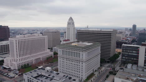 Drone-Shot-of-Los-Angeles-City-Hall,-US-Courthouse-and-Hall-of-Justice-Buildings,-California-USA