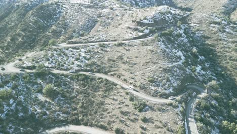 Vehicular-traffic-on-the-road-to-Farellones,-a-winding-route-in-the-country-of-Chile