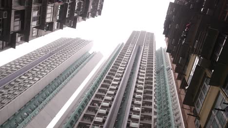 Apartment-Buildings-and-Condominiums-In-Residential-Neighborhood-In-Hong-Kong,-Low-Angle-Orbital-View