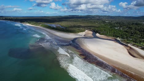 Belongil-Creek-And-Beach-In-New-South-Wales,-Australia---Drone-Shot