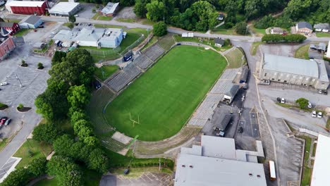 Rotating-drone-shot-of-The-Granite-Bowl-Stadium-in-the-granite-capitol-of-the-world