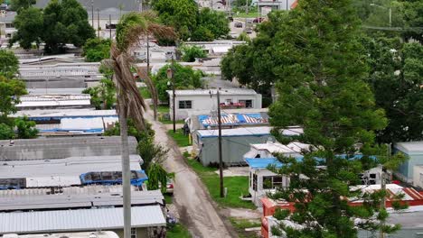 Aerial-tilt-up-shot-of-mobile-homes-in-low-income-district-of-Florida