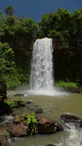 Argentina-Iguazu-Falls-Waterfall-Scenery,-Vertical-Video-for-Social-Media-Instagram-Reels-and-Tiktok-of-Big-Tall-Beautiful-Powerful-Waterfalls-at-Iguacu-Falls-in-Dramatic-Tropical-Landscape