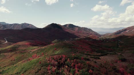 Aerial-drone-shot-of-Salt-Lake-City-mountain-range-with-fall-colored-leaves-at-60fps