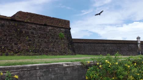 Sunset-at-São-José-de-Macapá-Fortress,-casting-golden-light-on-its-weathered-walls