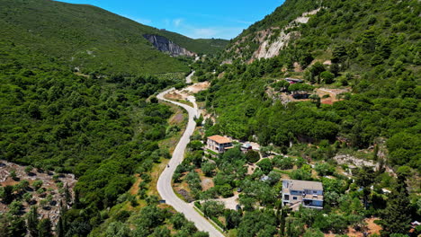 Beautiful-road-leading-through-valley-of-Greece,-aerial-view