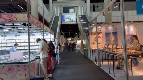 Pov-walk-in-exhibition-hall-of-nordstill-trade-fair-in-Hamburg