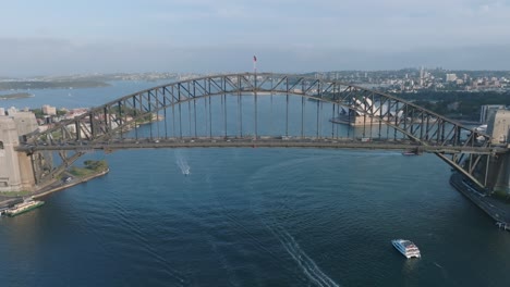 The-Sydney-Harbour-Bridge-,-an-iconic-steel-through-arch-bridge