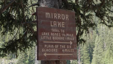 Mirror-Lake-Trail-sign-in-Canada,-scenic-tourist-spot-in-forested-paths