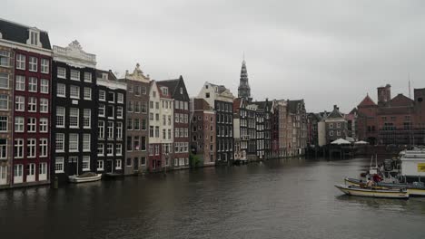 Dutch-Houses-Along-Amsterdam-Canal-In-The-Netherlands,-Europe