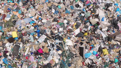 Dystopian-scene-of-overflowing-landfill-with-waste-marked-for-burning