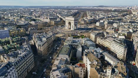 Approaching-aerial-view-about-the-famous-monument-of-the-Arc-de-Triomphe,-Paris,-France