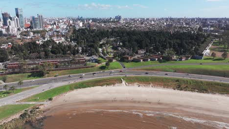 Montevideo-Uruguay,-Aerial-panning-view-of-Buceo-beach-revealing-coast-line