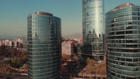 Flying-between-two-buildings-on-concrete-jungle,-Santiago,-Chile-4K