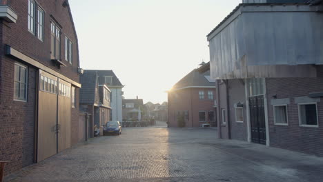 Walking-trough-an-old-farm-house-in-the-middle-of-a-village-in-the-early-morning