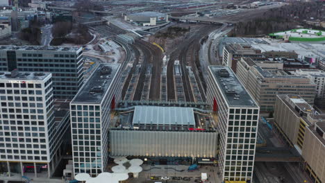 Aerial,-drone-shot-over-the-Mall-of-Tripla-shopping-center-and-the-Pasila-railway-station,-in-Helsinki,-Finland