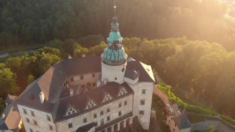 The-aerial-shot-of-the-magical-castle-in-Frydlant-in-Czech-Republic-during-sunset