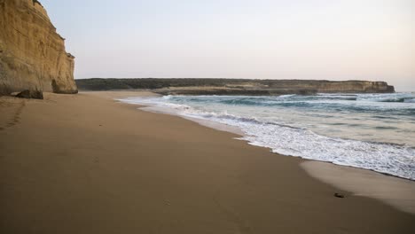 Timelapse-of-sun-setting-over-beach-near-the-mouth-of-the-Sherbrook-River,-Victoria,-Australia,-December-2019