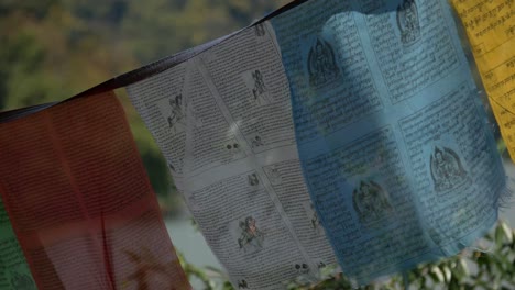 Prayer-Traditional-Nepali-Flags-over-Lake-Background