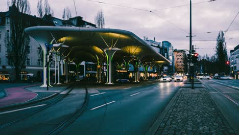 Night-time-lapse-of-famous-public-transport-station-"Münchner-Freiheit"-in-munich