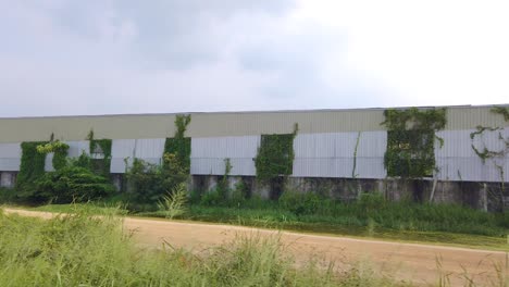 Urban-area-on-cloudy-day-seen-from-train-ride