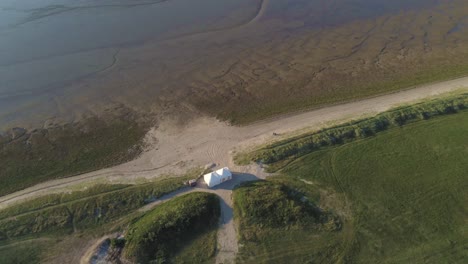 Aerial-View-of-Tent-on-North-Sea-Beach-Near-Wilhelmshaven,-Germany