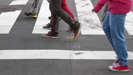 Landscape-view-of-the-lower-view-into-the-road-crossing-while-people-crosing-the-road-in-summer-daytime-in-Shibuya,Tokyo,Japan