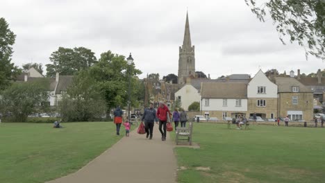 People-social-distancing-in-park-enjoying-fresh-air