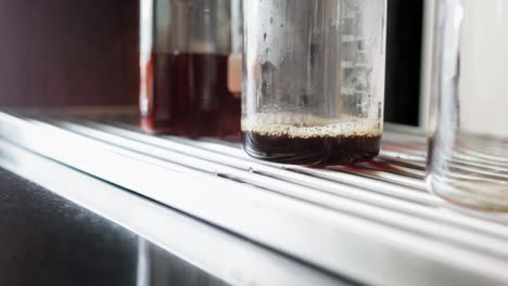 Close-up-shot-of-drip-coffee-brewing-in-coffee-house