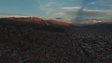 4K-daytime-aerial-drone-view-looking-over-the-Southern-part-of-Cusco,-the-famous-capital-of-the-Incas