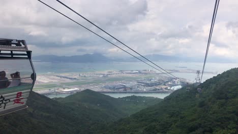 Cable-car-of-Lantau-island-going-up-with-people-on-board