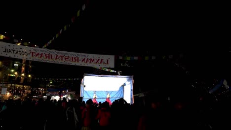 Two-young-girls-dancing-in-the-stage-along-the-street-during-the-21st-Street-Festival-Pokhara