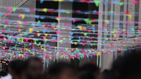 Small-colorful-triangular-flags-hanging-on-street