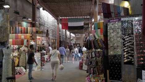 European-tourists-window-shopping-at-Deira-market-Dubai