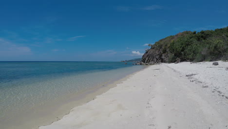 White-Sand-And-Clear-Sea-Water-In-A-Virgin-Island-In-Philippines-4K