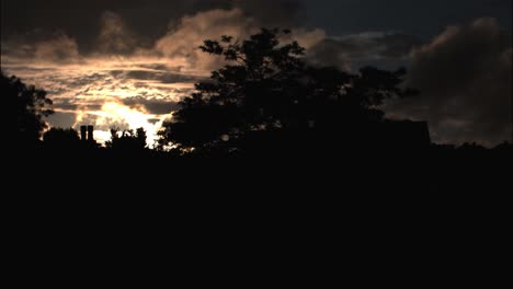 Dramatic-sky,-tree-silhouette-timelapse