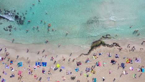 Aerial-top-down-view-of-a-sandy-beach