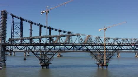 Steel-foundations-and-pillars-of-Hercilio-Luz-Bridge-under-restoration,-aerial