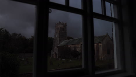 Time-lapse-of-Church-through-old-window